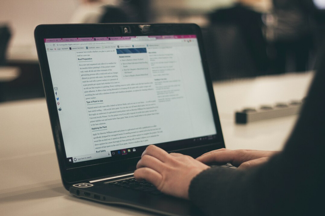 person writing blog post